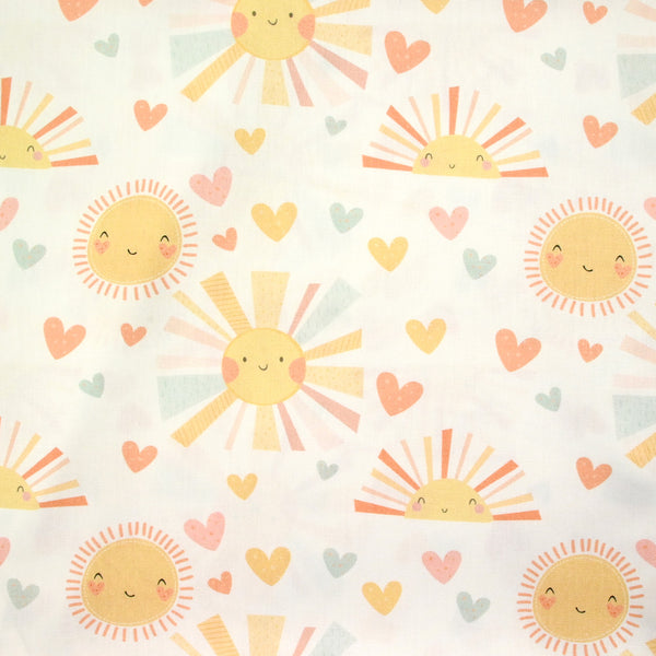 Coton imprimé soleil fond blanc cassé