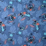 Coton imprimé Stitch fond bleu barbeau