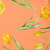 Coton imprimé tulipe jaune fond orange