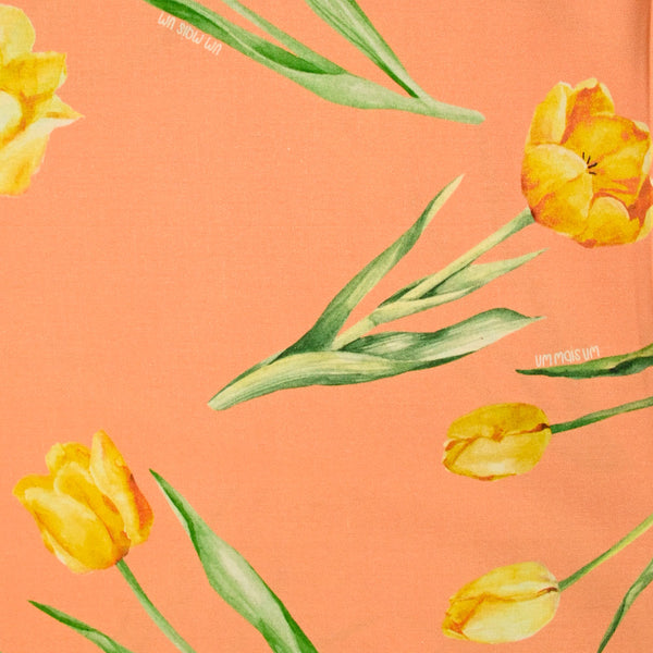 Coton imprimé tulipe jaune fond orange