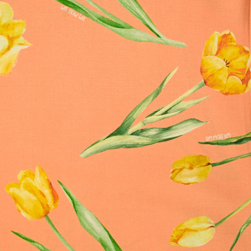 Coton imprimé tulipe jaune fond orange