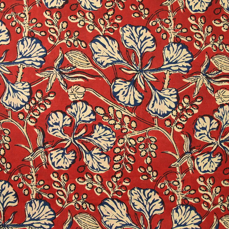 Coton indien imprimé Mandi bleu et beige fond rouge tomette