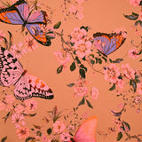 Crêpe lourd imprimé papillon rose fond sable