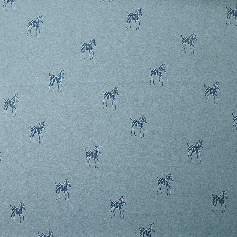 Crêpe satin de polyester imprimé zèbre fond bleu charrette