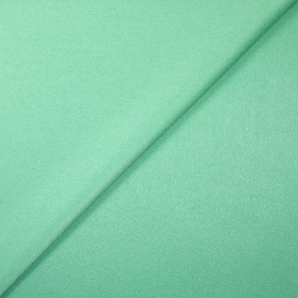 Crêpe satin effet lavé vert d'eau