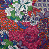 Crêpe satin polyester imprimé cachemire et fleurs brique, magenta et violet