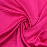 Crêpe satin de polyester uni rose barbie