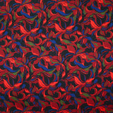 Crêpe satiné de polyester Amaryllis rouge et bleu marine fond noir