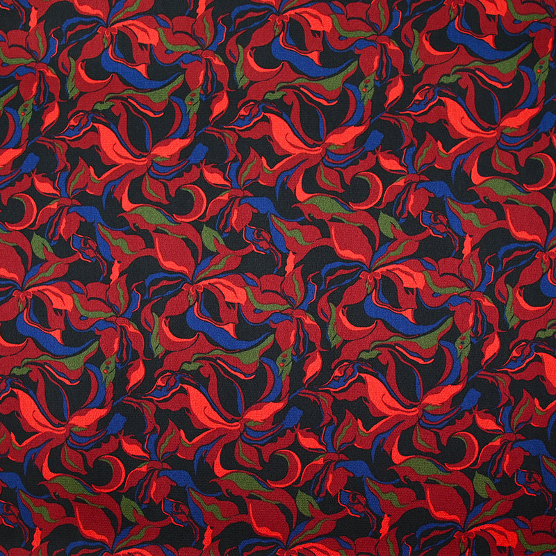 Crêpe satiné de polyester Amaryllis rouge et bleu marine fond noir