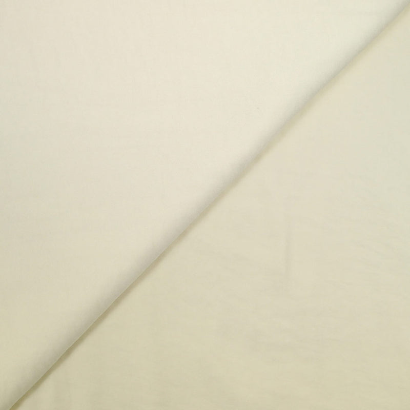 Crêpe satiné de polyester blanc cassé