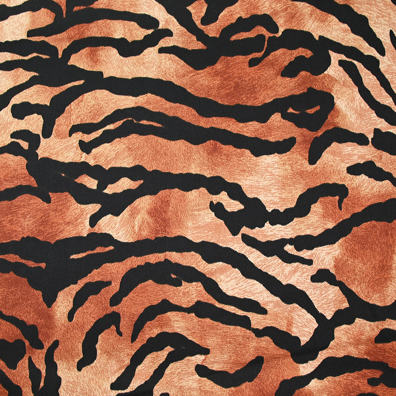 Crêpe satiné de polyester tigre noir fond marron