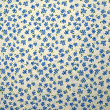 Crêpe viscose imprimé fleurs bleues fond écru