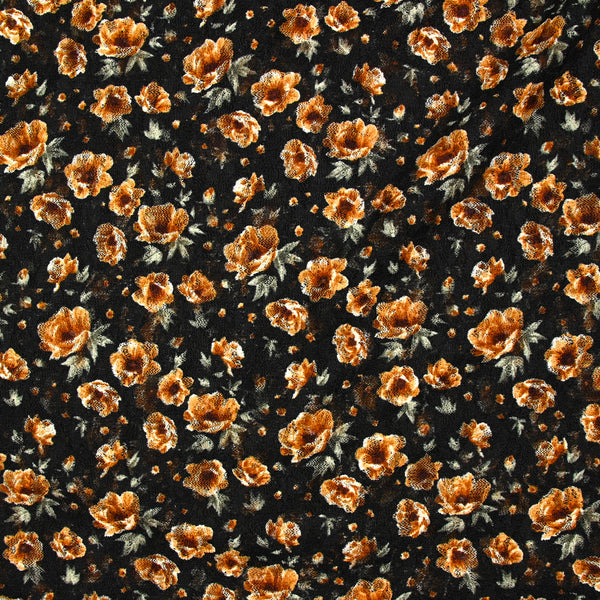 Dentelle imprimée fleurs camel fond noir