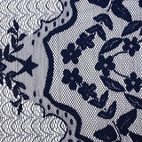 Dentelle polyester brodée sur résille bleu marine