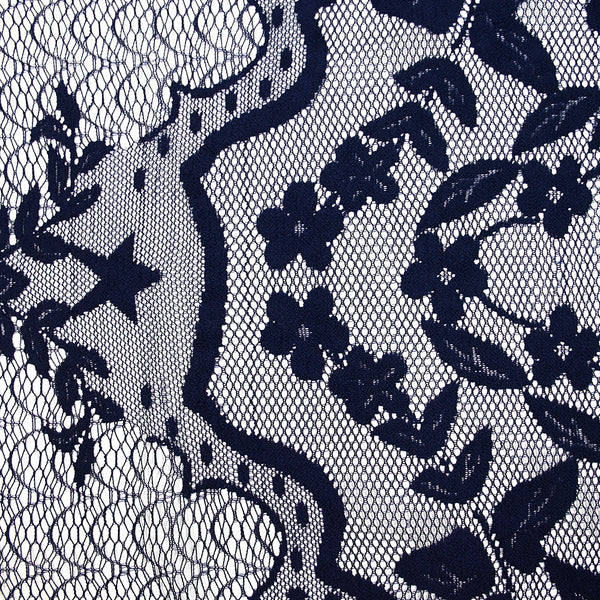 Dentelle polyester brodée sur résille bleu marine