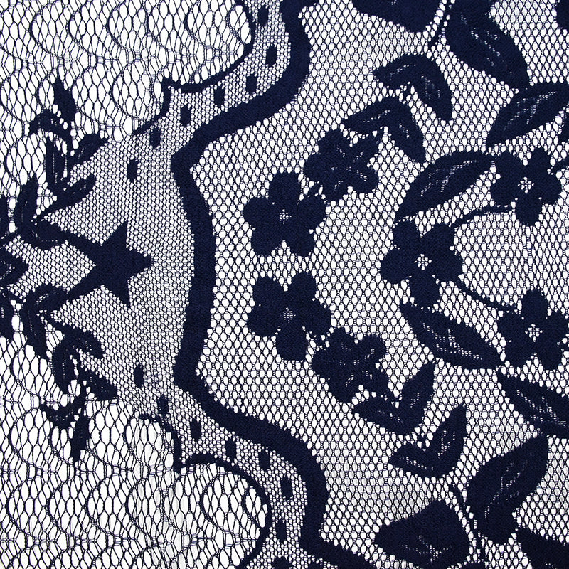 Dentelle polyester brodée sur résille bleu marine