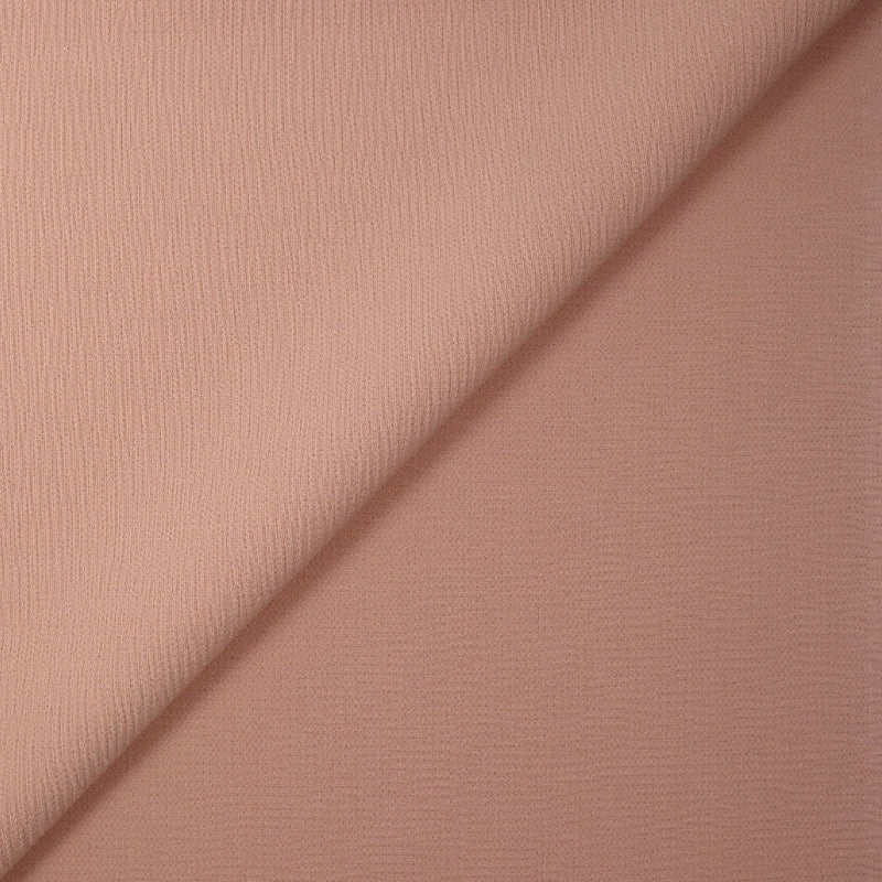 Double crêpe de polyester rose poudré