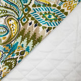 Double gaze matelassée double face ikat et cachemire vert et ocre au mètre