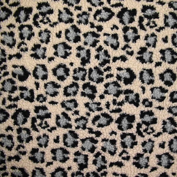 Fausse fourrure léopard gris fond beige