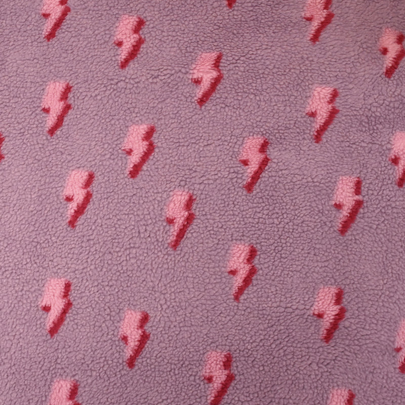 Fausse fourrure sherpa éclairs fond lilas