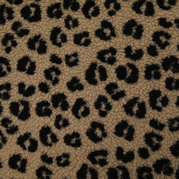 Fausse fourrure sherpa léopard noir fond marron