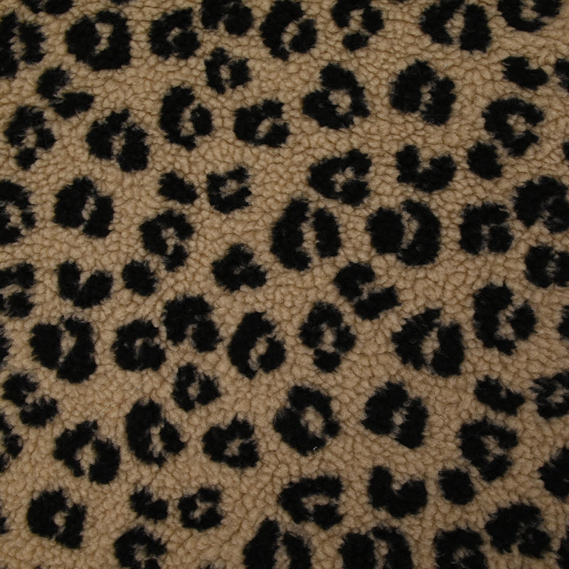 Fausse fourrure sherpa léopard noir fond marron