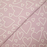 Flanelle imprimé cœurs fond mauve