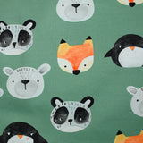 Gabardine de coton imprimé animaux fond vert
