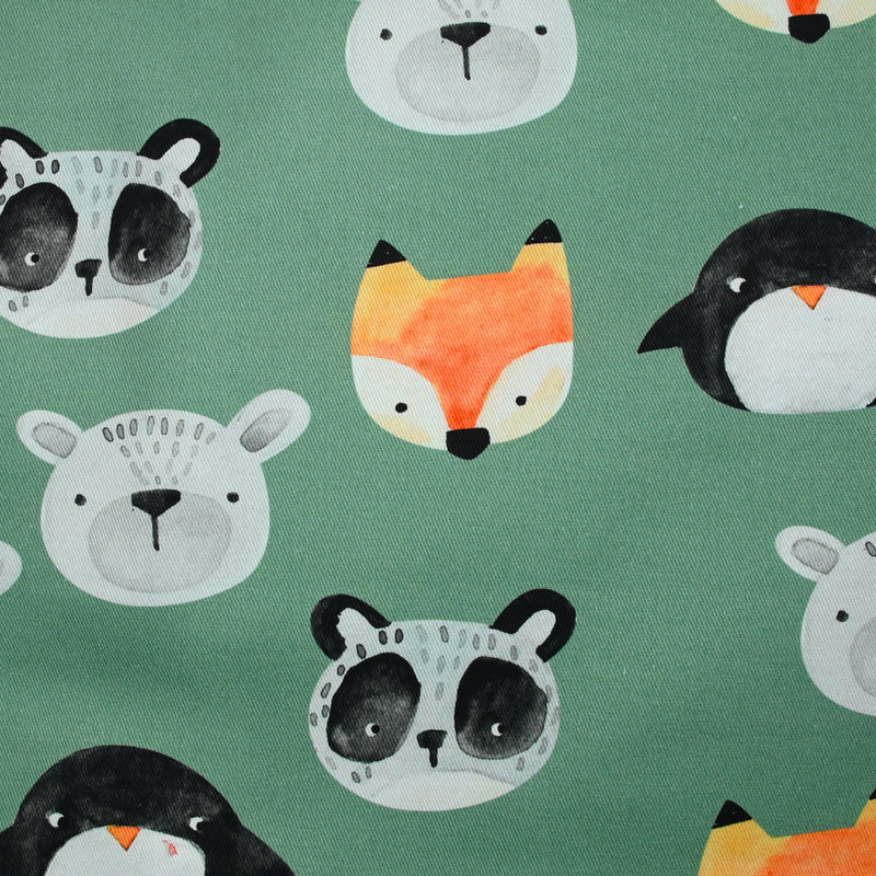 Gabardine de coton imprimé animaux fond vert