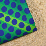 Gabardine de laine mélangée imprimée gros pois bleu fond vert