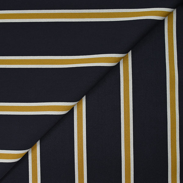 Gabardine de laine mélangée rayée écru et moutarde fond marine