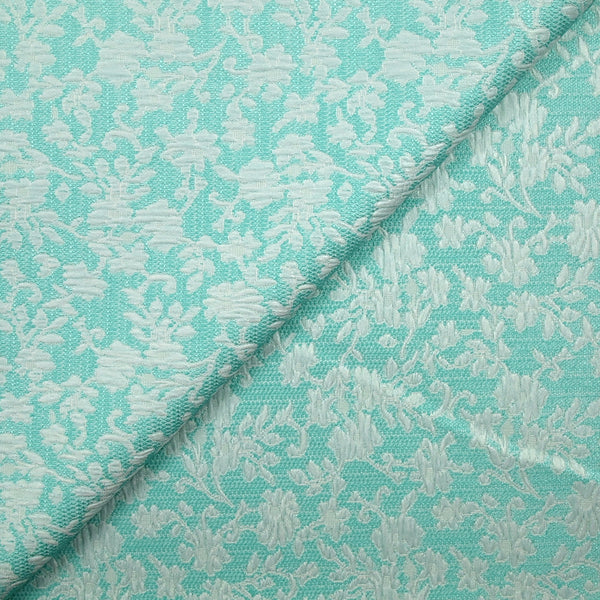 Jacquard de polycoton liaison de fleurs fond turquoise