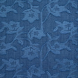 Jacquard de polyester fleurs plumetis bleu
