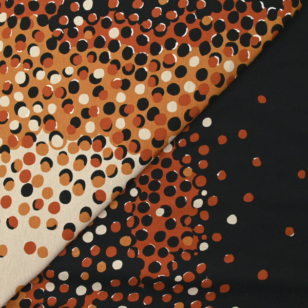 Jersey de coton imprimé évasion de pois noir, rouille et sable
