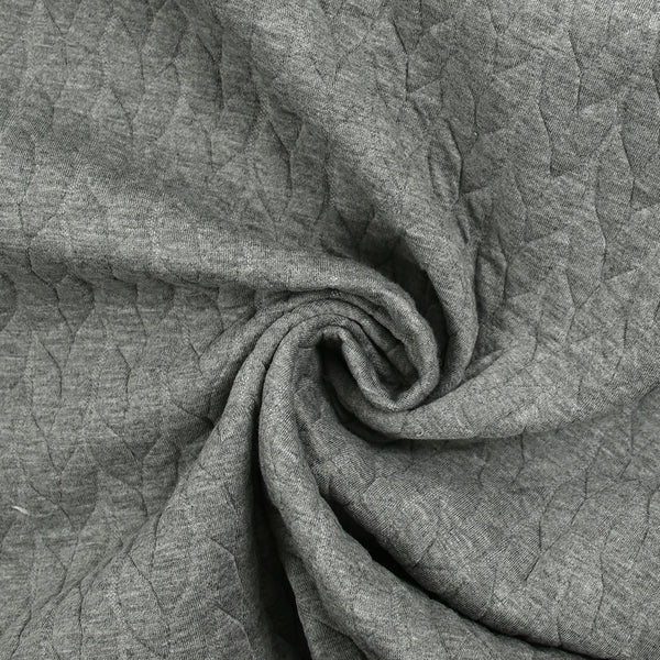 Jersey matelassé tresses fond gris chiné