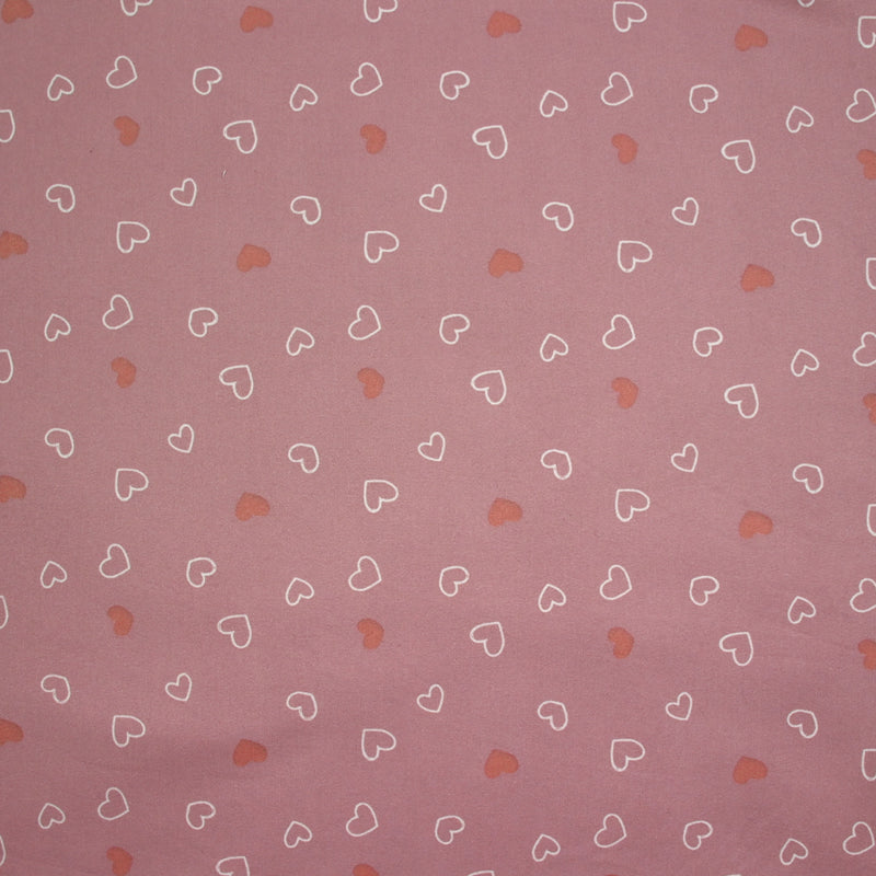 Jersey tout doux imprimé petits cœurs fond rose