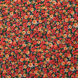 Maille crêpe imprimée fleurs rouges fond noir