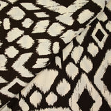 Maille de polyester imprimée ikat marron fond écru