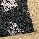Maille de viscose satinée imprimé pois et fleurs fond noir