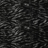 Maille dentelle ajourée feuillage fond noir