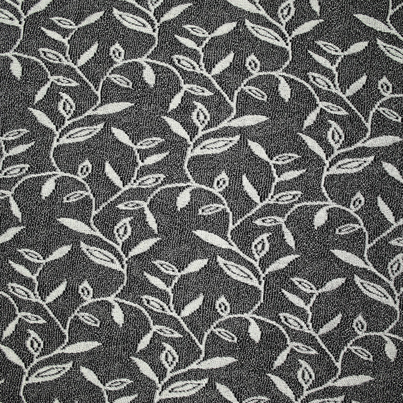 Maille dentelle ajourée motif végétal blanc fond noir