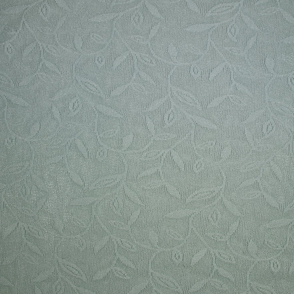 Maille dentelle ajourée motif végétal fond vert d'eau