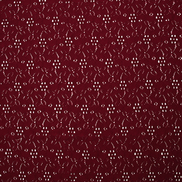Maille polyester ajourée fleurs fond bordeaux