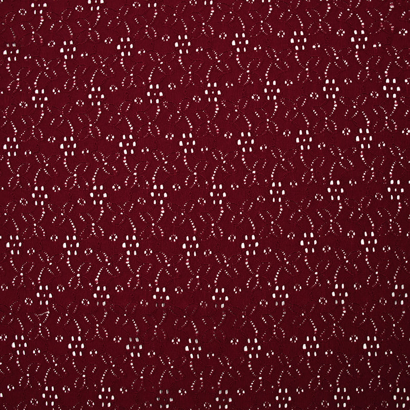 Maille polyester ajourée fleurs fond bordeaux