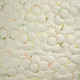 Matelassé brodé fleurs multicolores fond écru