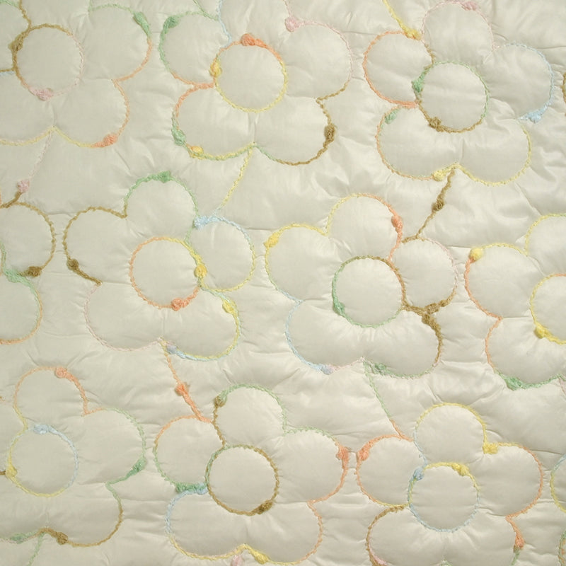 Matelassé brodé fleurs multicolores fond écru
