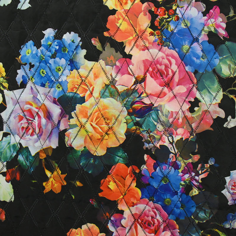 Matelassé imprimé fleurs colorées fond noir