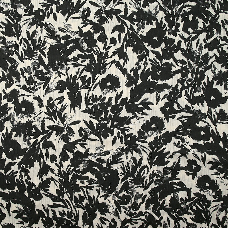 Mousseline crinkle satinée imprimée fleurs en négatif noir fond écru