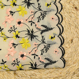 Mousseline de soie brodée festonnée écru au mètre