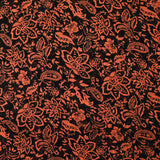 Mousseline imprimée cachemire orange fond noir